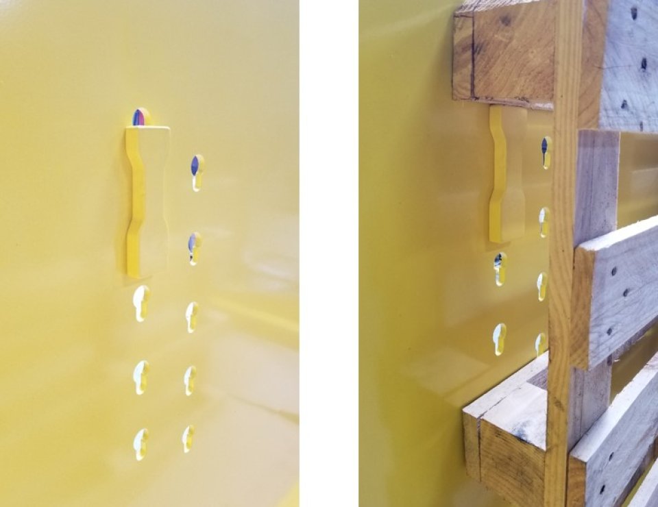Système de retenue pour palette sur basculeur Serema